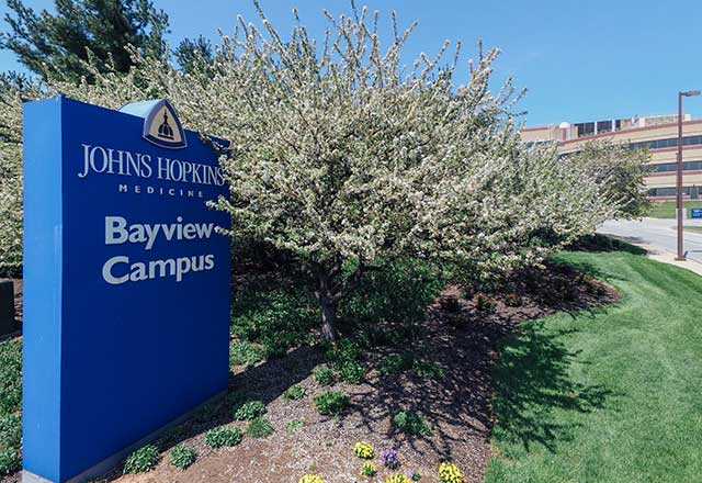Bayview Campus sign in front of a parking garage
