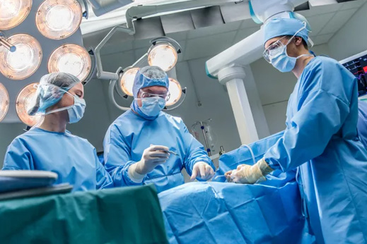 Surgeons performing surgery.