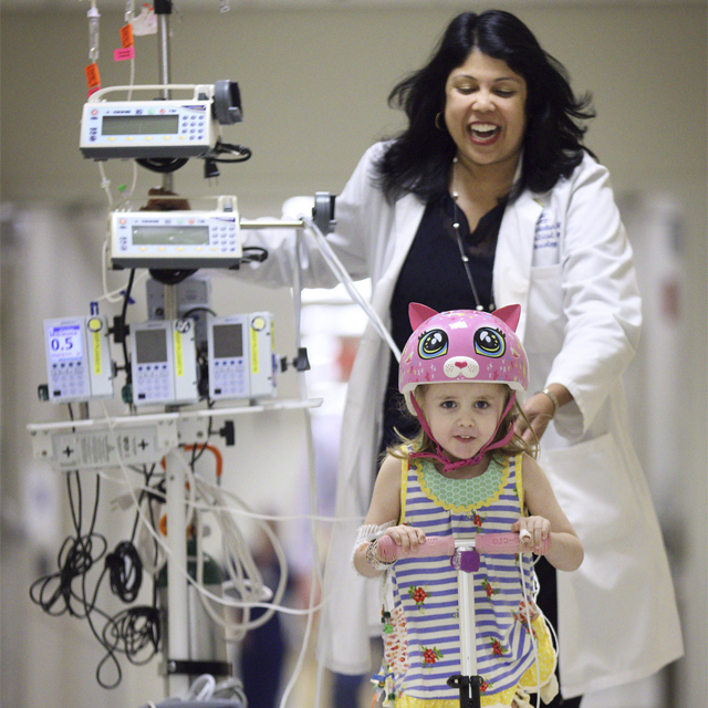 Critical care specialist Sapna Kudchadkar with 4-year-old patient, Avery Doehne.